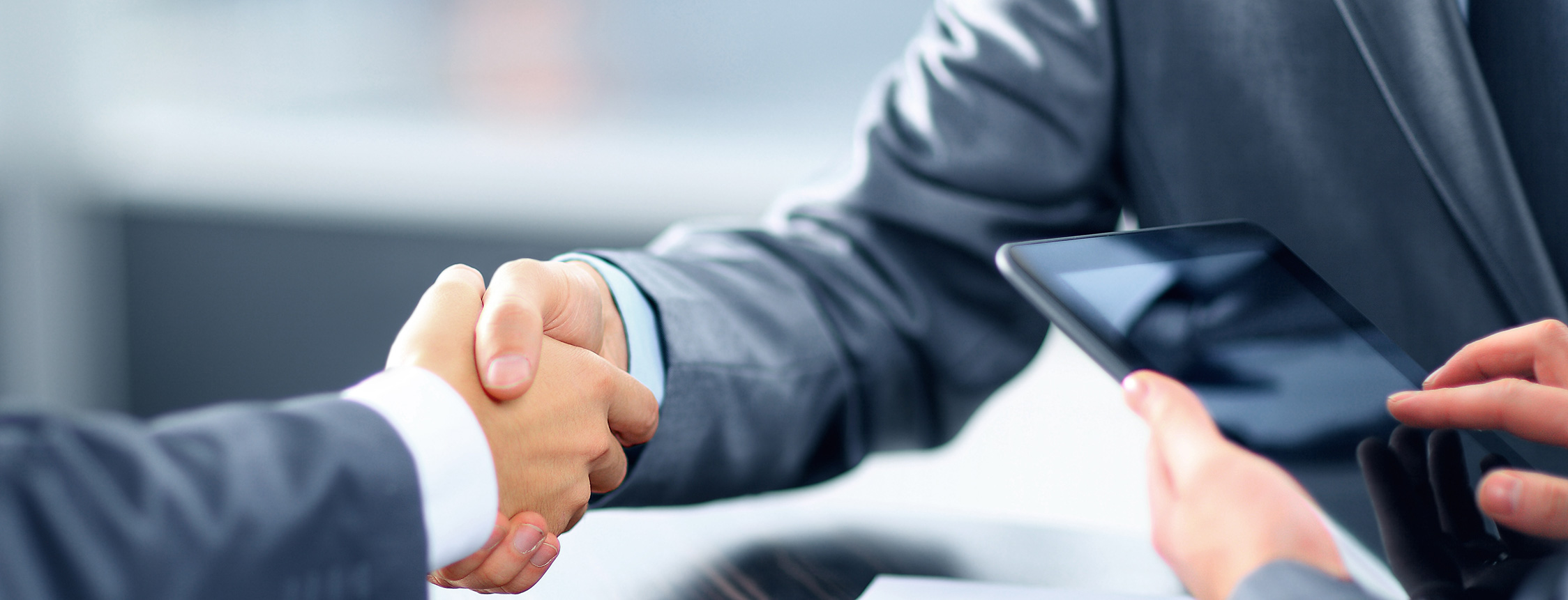 bigstock-Business-handshake-crop2